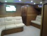 Кают-компания с белыми диванами на яхте Ольга 18 - Yachts.ua