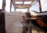Кают-компания с белым кожаным диваном на яхте Адмирал - Yachts.ua