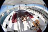Зона отдыха с тентом и столом на яхте Синдбад - Yachts.ua