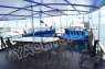Полуоткрытая летняя площадка на корме яхты Роял Марис - Yachts.ua 